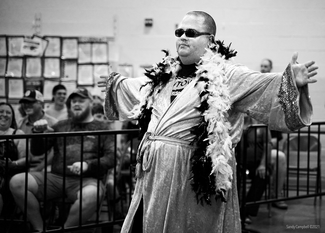 Someone has to be the pretty boy villain that stokes the crowd.