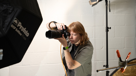 Behind the scenes content of commercial photographer Julie on set. Image by Nancy Kim Photography