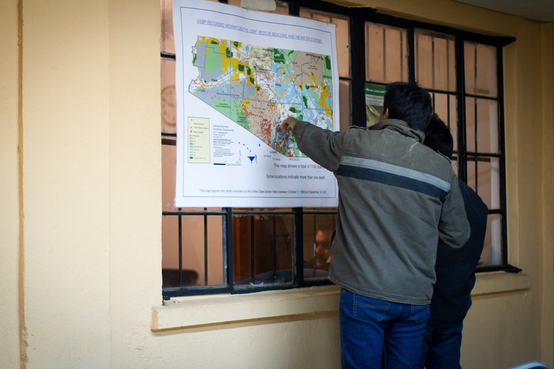 Rodriguez is one of many migrants who have attempted to cross the border multiple times. Here, two migrants study a map of the Sonoran desert in southern Arizona at Albergue San Juan Bosco.