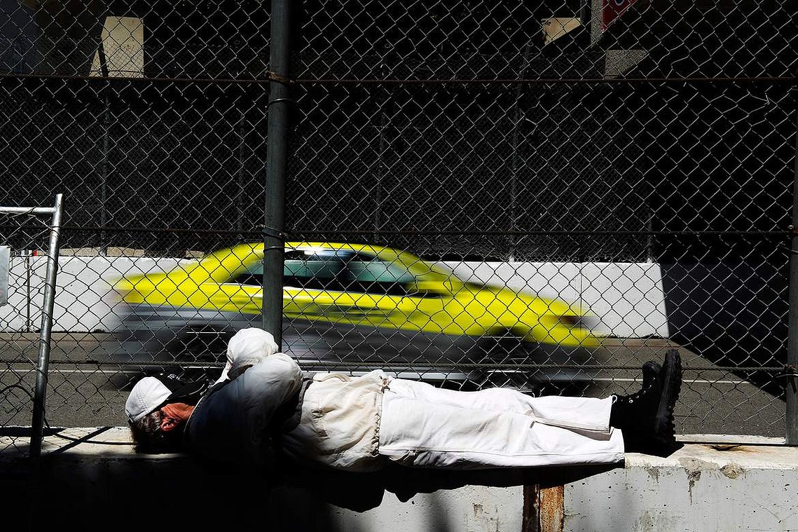 Richard Wood takes a moment to nap before the start of the INDYCAR practice on the first day of the Toyota Grand Prix of Long Beach on April 11, 2014. 