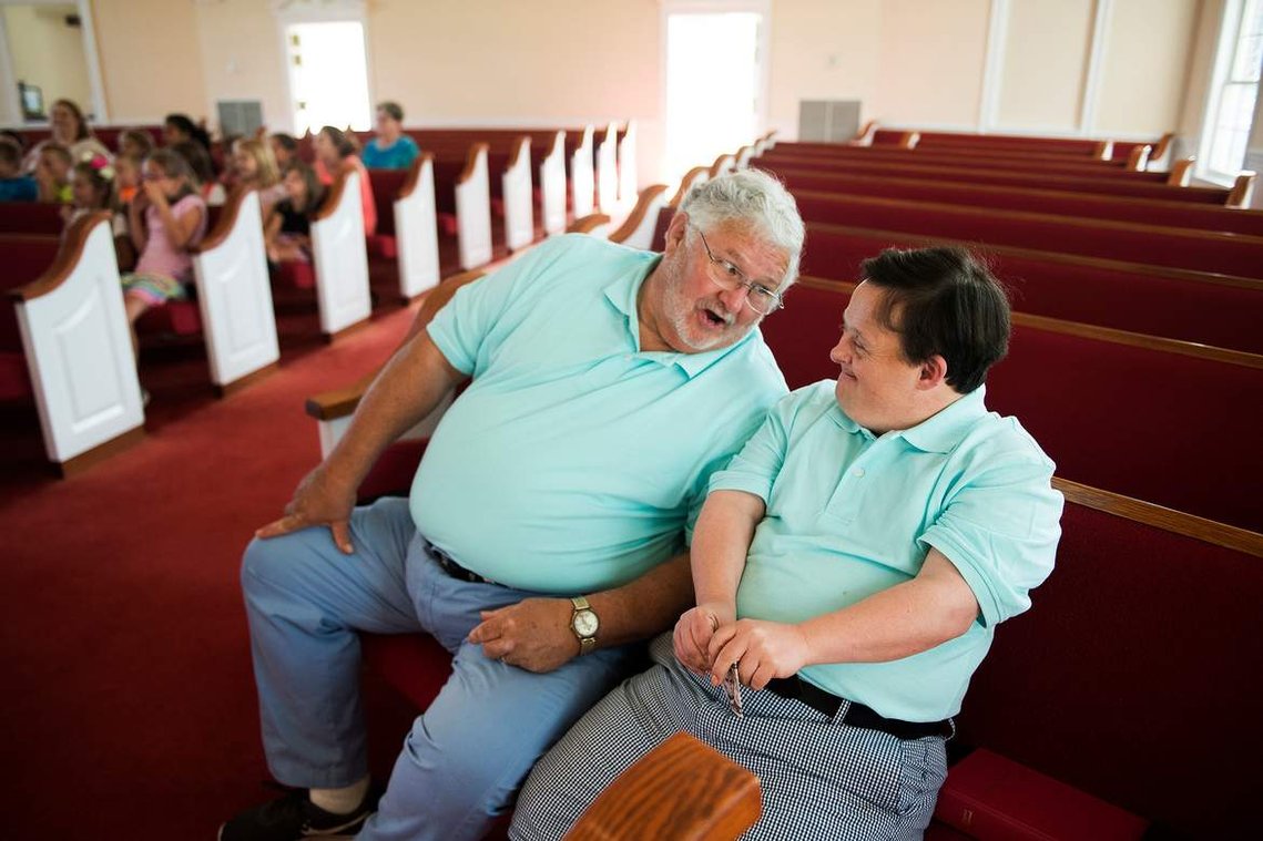 Greenville County councilman Joe Dill sits with his son Joel at Blue Ridge Baptist Church during bible camp on Monday, June 12, 2017. 
