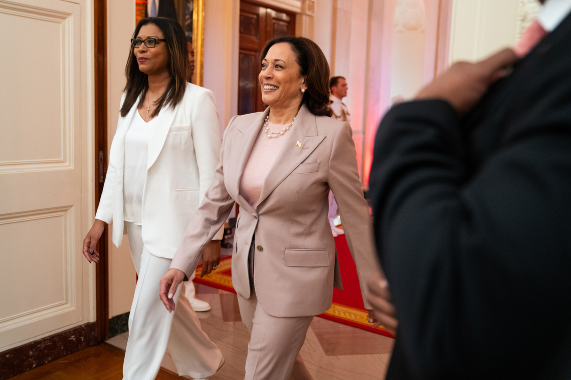 Vice President Kamala Harris and Las Vegas Aces president Nikki Fargas walk into the East Room of the White House to celebrate the team’s 2022 WNBA championship victory.