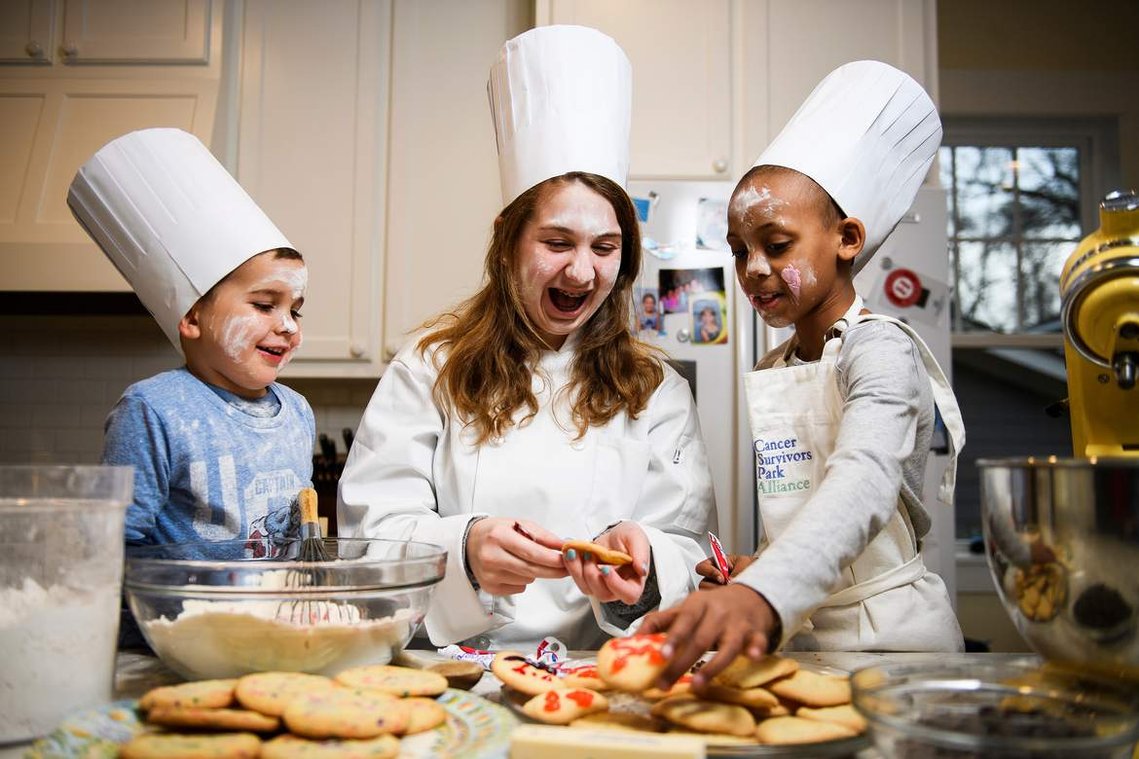From left, Jack Williams, 4, Clara Lawrence, 13, and Myleigh McDowell, 8, pose for a portrait on Thursday, Feb. 14, 2019. The three childhood cancer survivors will be participating in the upcoming CHOP! Cancer cook-off.