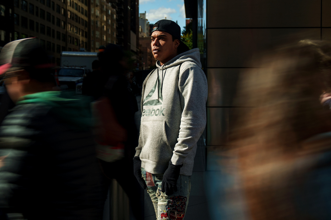Jhonny Ramos, an asylum seeker from Venezuela, poses for a portrait in Manhattan near the shelter where he is currently staying in Wednesday, Oct. 18, 2022. Ramos was one of several thousand asylum seekers who were bussed from Texas to 