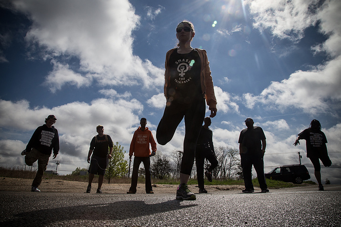 Sophie Ellman-Golan leads the marchers in stretches ahead of the final push into Washington, D.C.