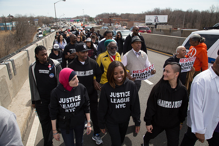Linda Sarsour, Tamika Mallory, and Carmen Perez lead the March 2 Justice as it sets out across Outerbridge Crossing from Staten Island.