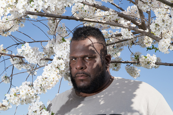 Quadir Lateef poses for his next album cover during a rest stop in Maryland.