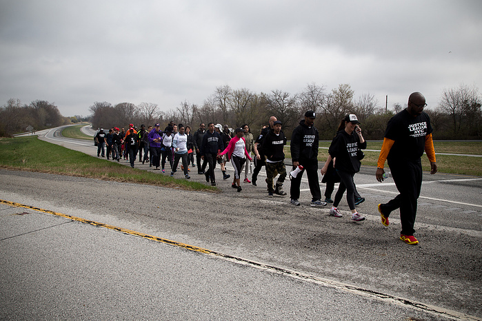 Marchers head down a stretch of Route 1 near the Pennsylvania-Maryland border. Pennsylvania state troopers had threatened to make arrests if the marchers attempted to walk this stretch. Though the marchers spent the three-mile march to the border on the l