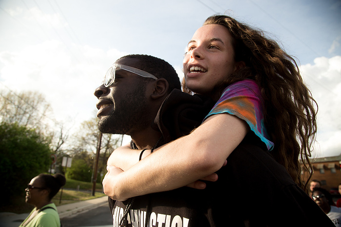 Darius Gordon carries Skylar Shafer as they come within sight of the Washington, D.C. border.