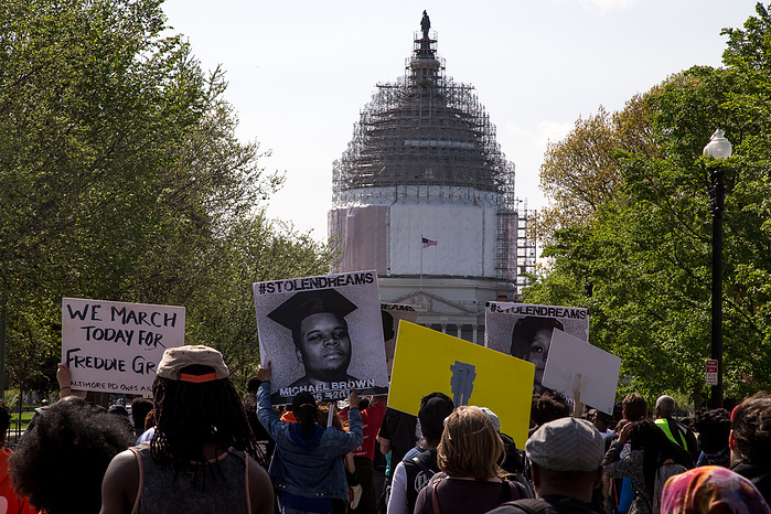 Marchers take to the streets of Washington, D.C. on their way to their final rally at the Capitol building.