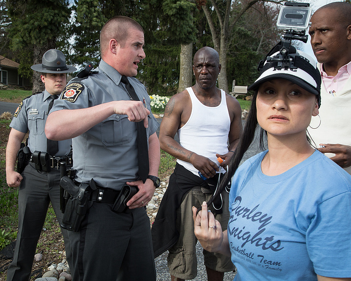 Pennsylvania state troopers order marchers to stay on the shoulder of the road and refrain from interfering with the flow of traffic on Route 1 in southeastern Pennsylvania. The only person who they asked for identification was Ron Fletcher, center, "so t
