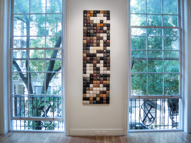 Slip-cast ceramic dimensional squares measuring two-inches make up Traffic Patterns NYC, a ceramic wall installation by artist Kathy Erteman for an exhibition at Jane Hartsook Gallery, Greenwich House Pottery, NYC. 