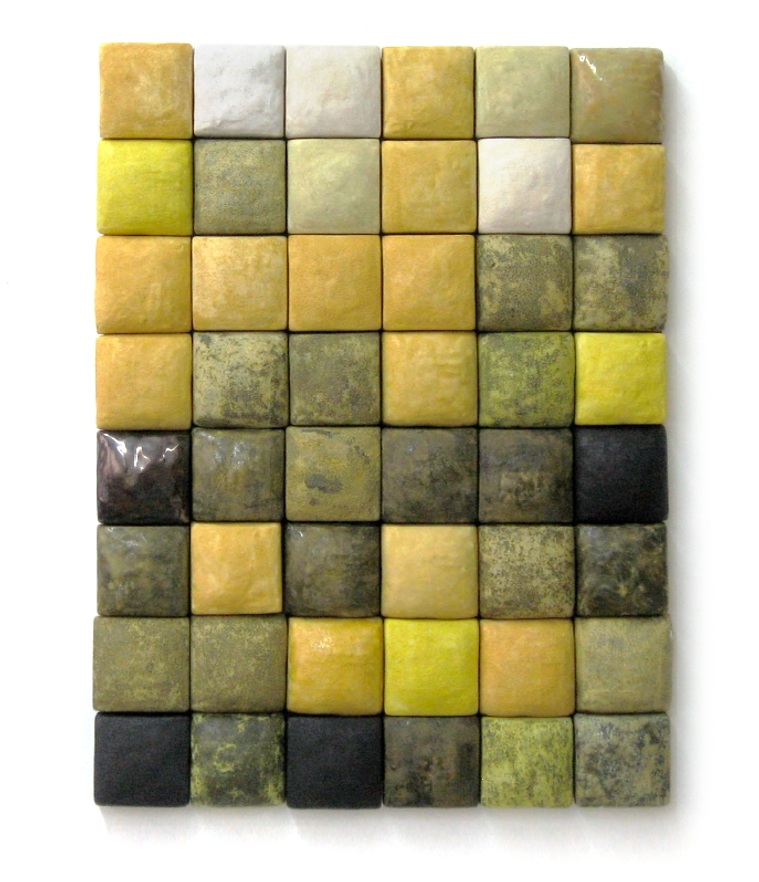 The Sunflower architectural installation by Kathy Erteman gets its name from the various yellow hues sprinkled in the composition made of two-inch ceramic squares mounted on a panel. Black and white textured glazes on other tiles form contrast.