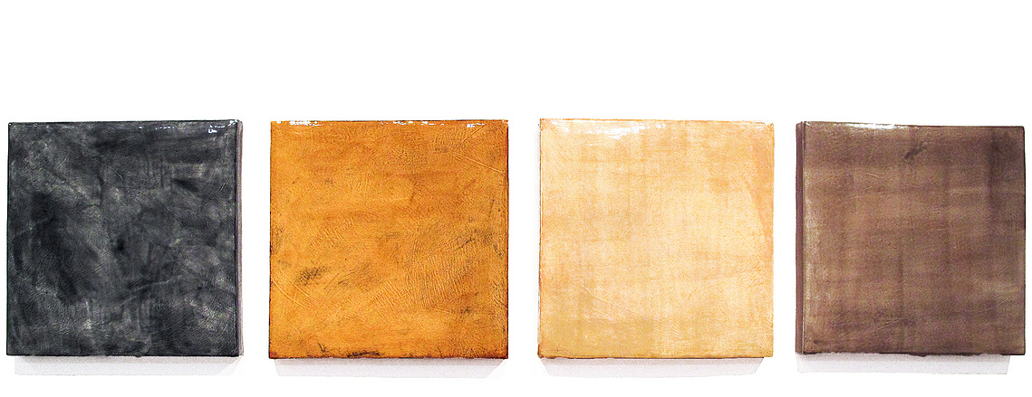 High Gloss is a ceramic art installation hand-built of porcelain Squares by Kathy Erteman. In a bright/dark contrast, the artist textured each tile in gloss glazes in grey, amber, pale yellow, and smoke hues. This is a custom handmade ceramic design