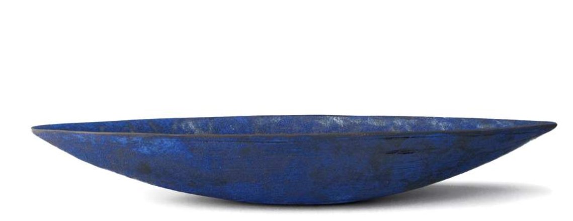 Hand-built of stoneware by ceramic artist Kathy Erteman, Cobalt Indigo Boat has a deep blue texture glaze. Available through the artist and Hostler Burrows Gallery, this sculptural ceramic piece is luminous in a Yves Klein blue.