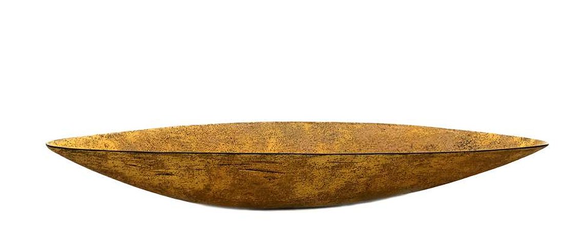 The fluid lines of the top rim and the delicate profile of the Titanium Boat is a hallmark of Kathy Erteman’s sculptural ceramics. The brilliant yellow-orange glaze has black undertones that bring the rust-colored sculpture texture.