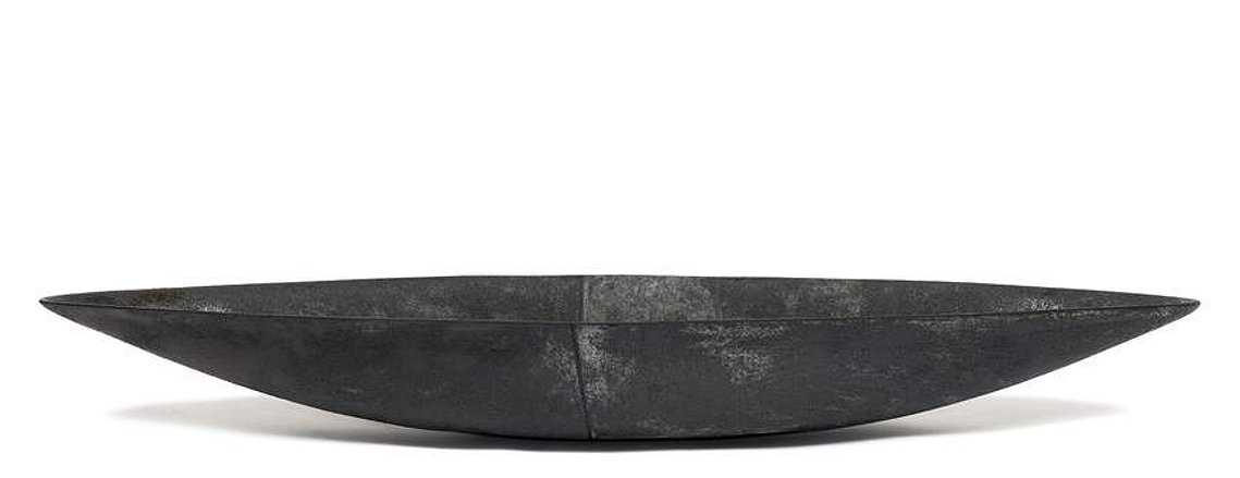 Hudson Valley-based artist Kathy Erteman hand-built the Two-Tone Gray Boat from stoneware. Slab-built with a half blue gray and half soot gray glaze, the minimal form of this ceramic vessel is strengthened by the subtle color shift and black dividing line