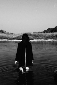 black and white Sacramento lake model moody walking through water