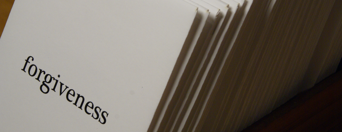 photographs from douglas rosenberg's relational performance art work forgiveness, showing white envelopes from the performance labeled forgiveness, containing hyacinth seeds
