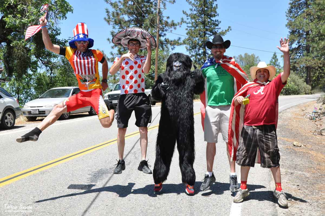 Goofy fans jumping up and down in costumes at the Amgen Tour of California bike race in May 2012.