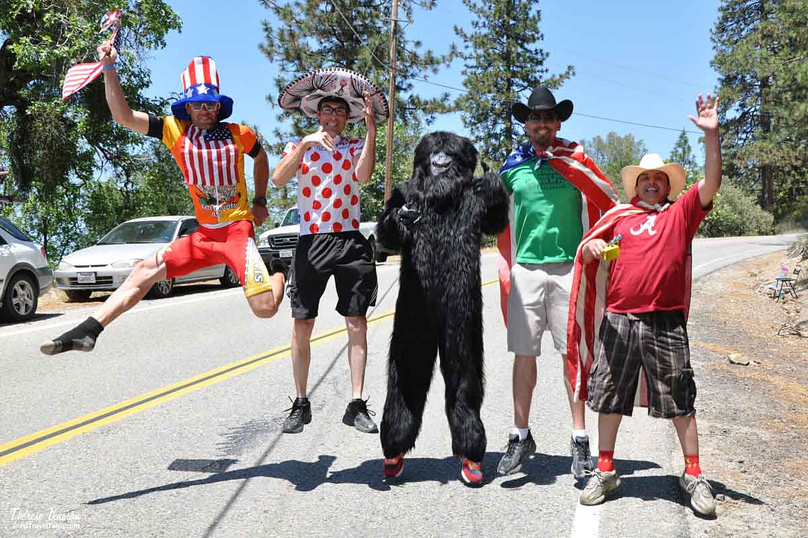 Goofy fans jumping up and down in costumes at the Amgen Tour of California bike race in May 2012.