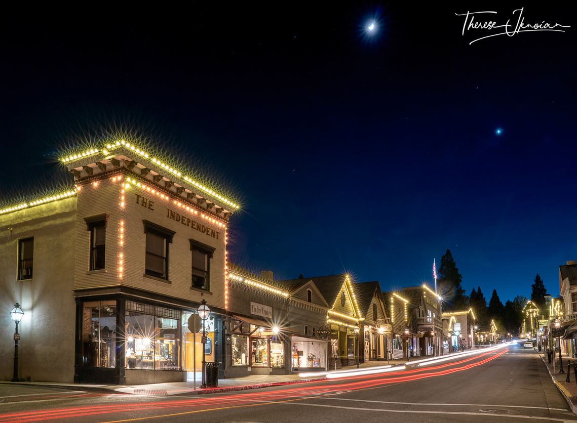 Night photo of car trails in downtown Nevada City in California. 