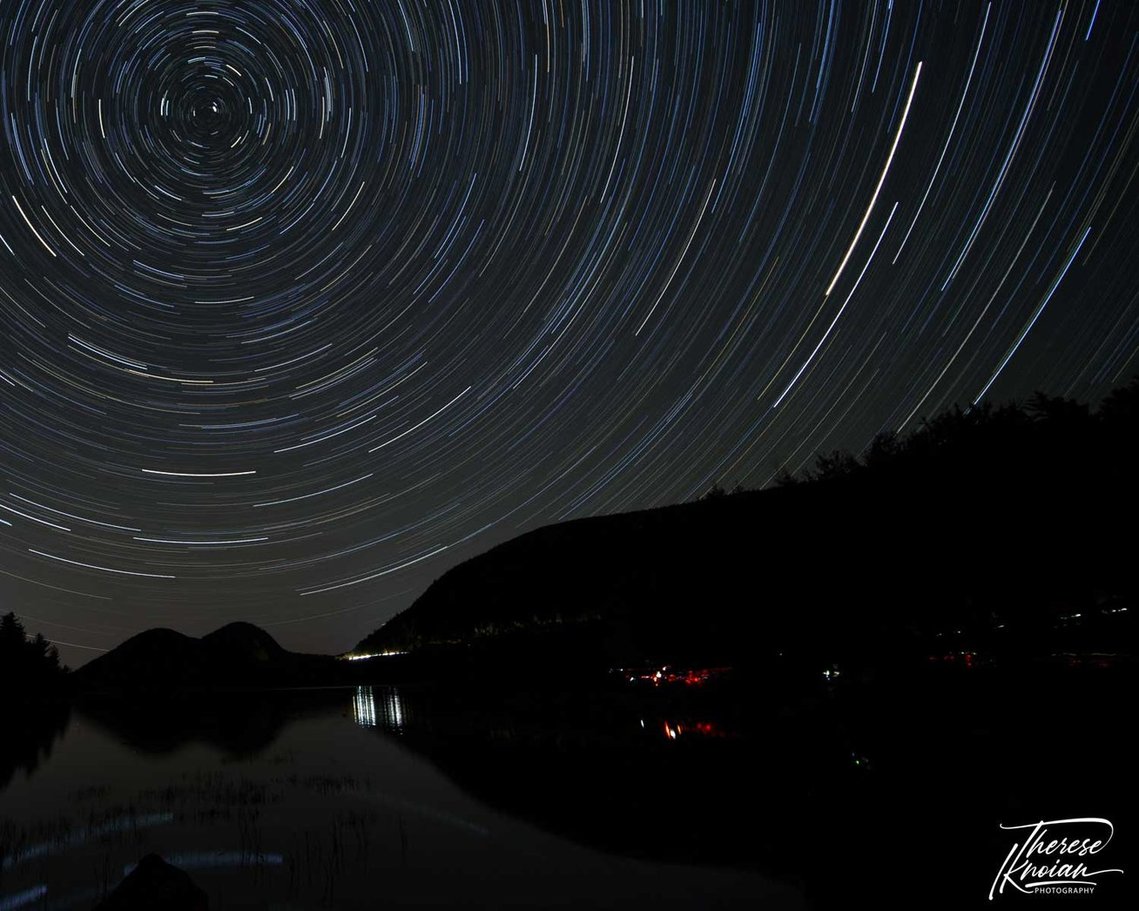 Star circles over Jordan Pond in Acadia National Park with light pollution from other photographers who forgot to turn off their lights. 