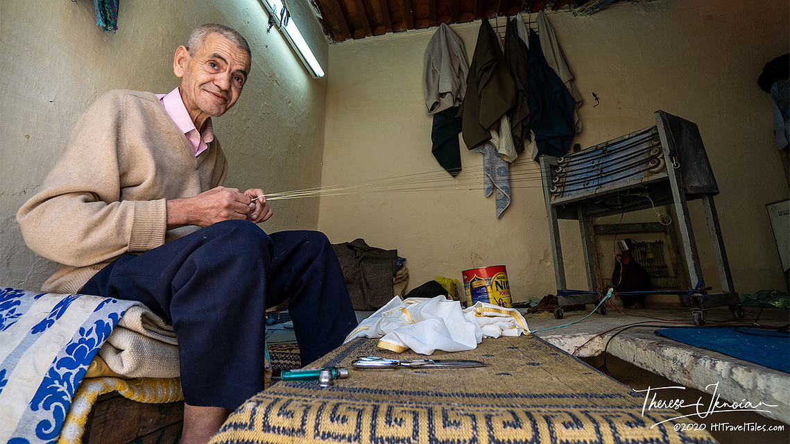 In Meknes, Morocco, a man sewing. 
