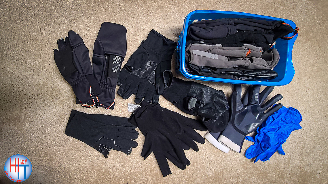 Collection of gloves for keeping hands warm during cold weather photography. 