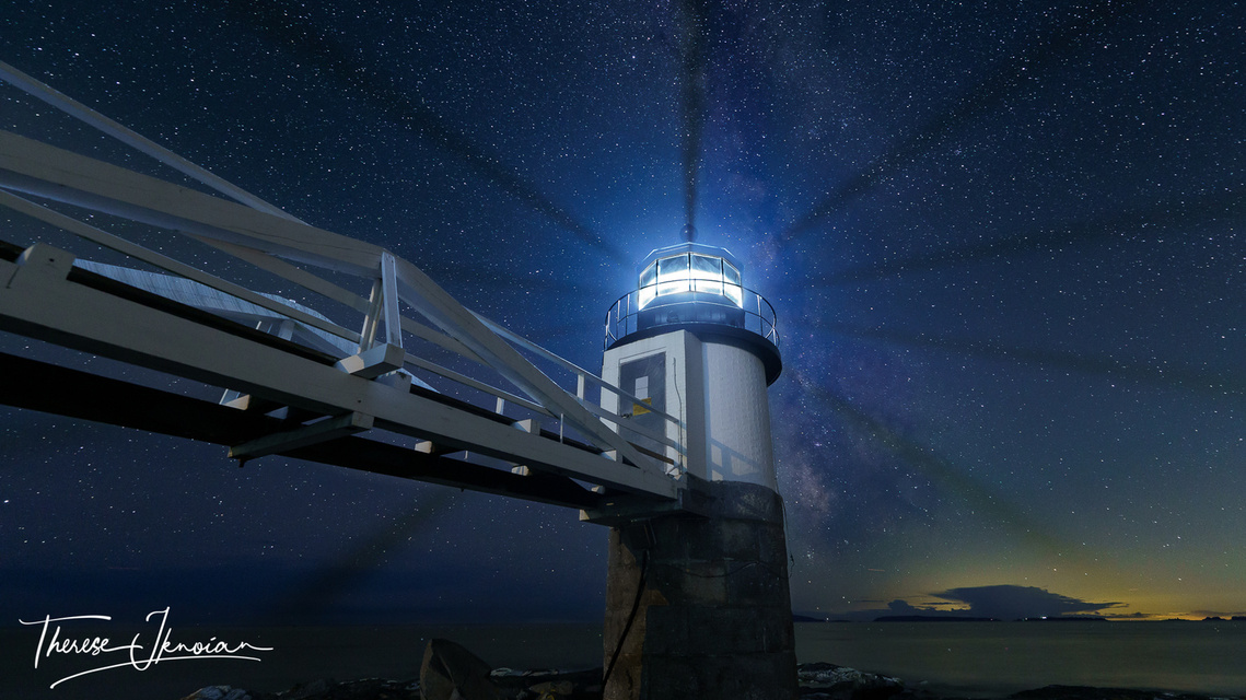 Marshall Point lighthouse  and Milky Way with light creating a pinwheel