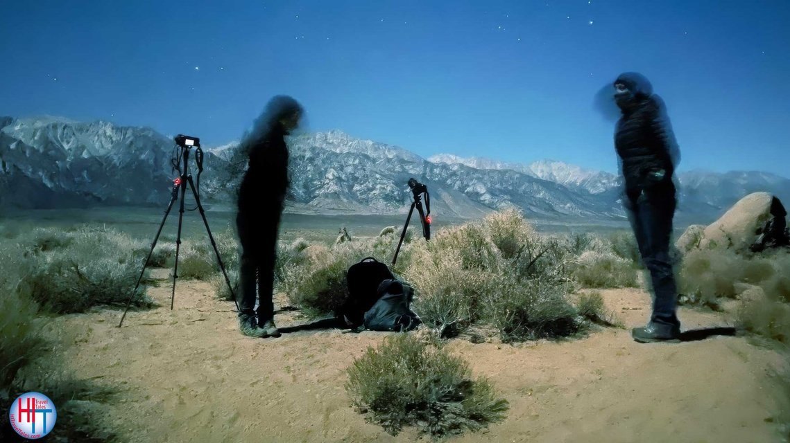 Two photographers at Alabama Hills taking photos at night. 