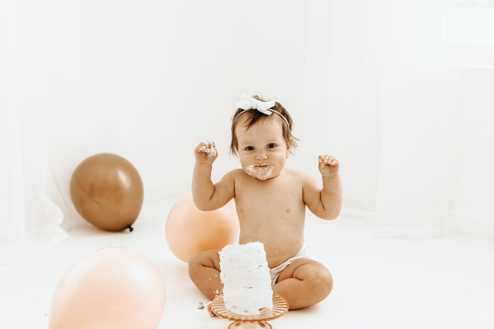 Minnesota Photographer capturing 1st Birthday Cake Smash at Brooke Elisabeth Studio in Ramsey, MN. 