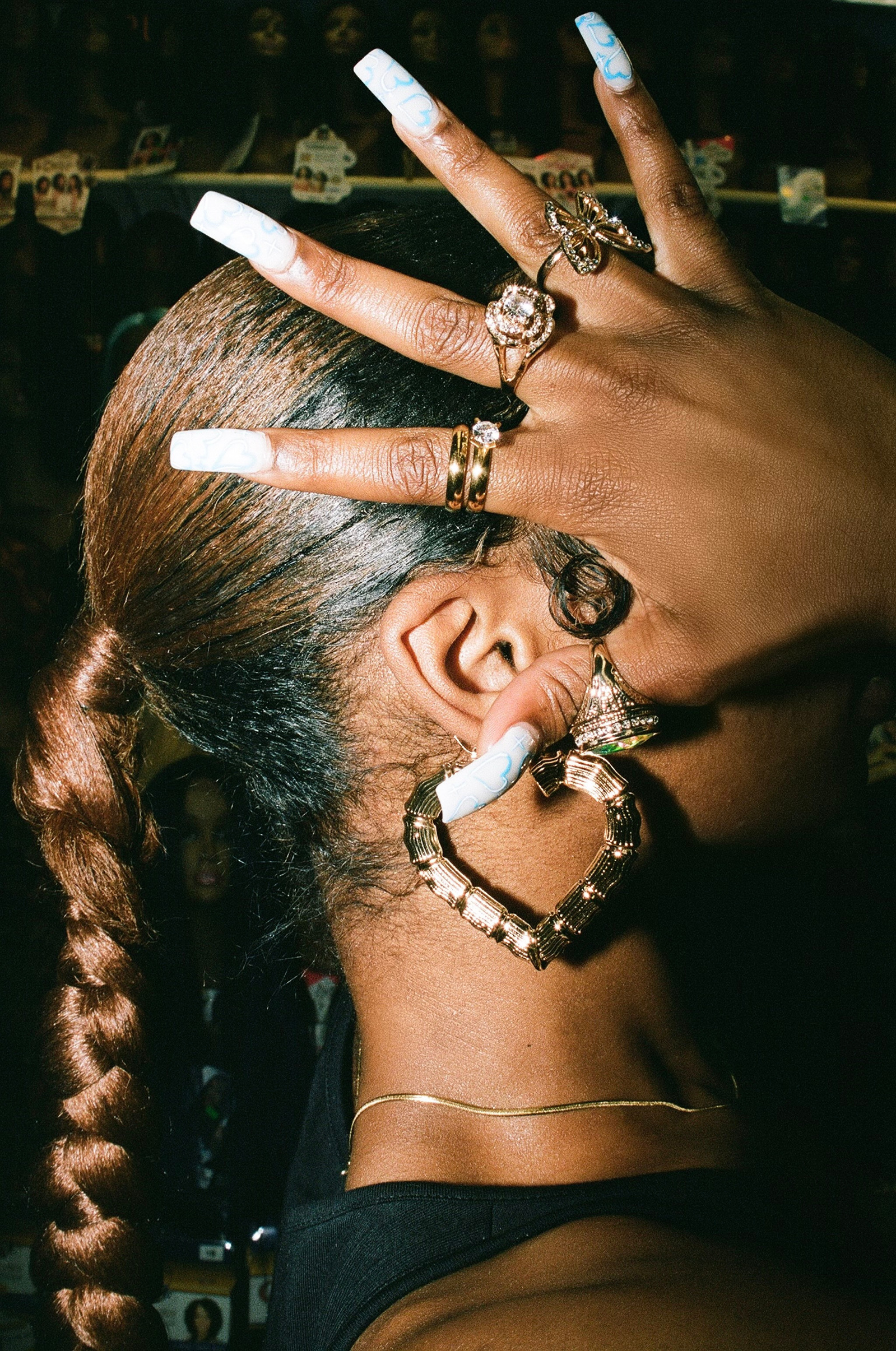 This shoot was inspired by the influence black women have on fashion and culture. The gold rings and long nails were reminiscent of black women in the 90s. I shot, styled and directed this project. These photos were taken using 35mm film.