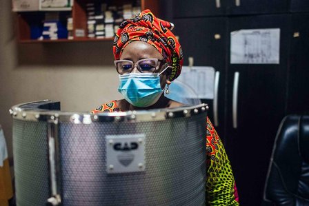 Moji Makanjuola during a voice over session at her studio in Garki, Abuja, Nigeria on Wednesday 16 December 2020. KC Nwakalor for Global Citizen.