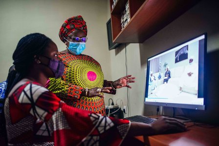 Moji Makanjuola interacts with some of her staff at her Studio in Garki, Abuja, Nigeria on Wednesday 16 December 2020. KC Nwakalor for Global Citizen.