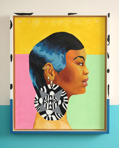 Large framed brightly coloured acrylic painting. Portrait profile of woman with short shiny hair and large patterned earring. Framed with black and white pattern. Created by northern artist Mary Naylor.Associate member of Ebor Studio. Exhibited in 2022