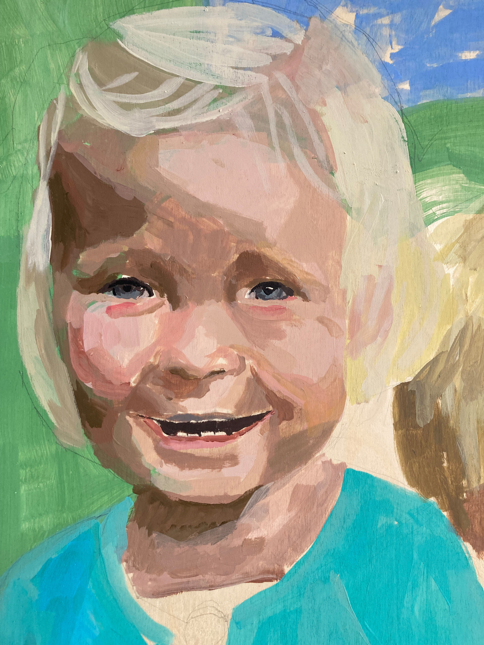 A close-up photograph of a painted portrait which is still in process. It depicts a young blonde child in a blue cardigan. The painting is made by the female British artist Mary Naylor in her Scarborough Studio
