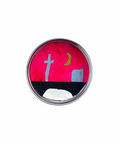 A small painted canvas collage, framed in a tin jar lid. Featuring a graveyard and a thin moon. Made by artist Mary Naylor. Created during her Mothership NewYork City Residency.