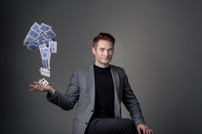 Branding photos for a magician flipping cards shot in our Edmonton studio