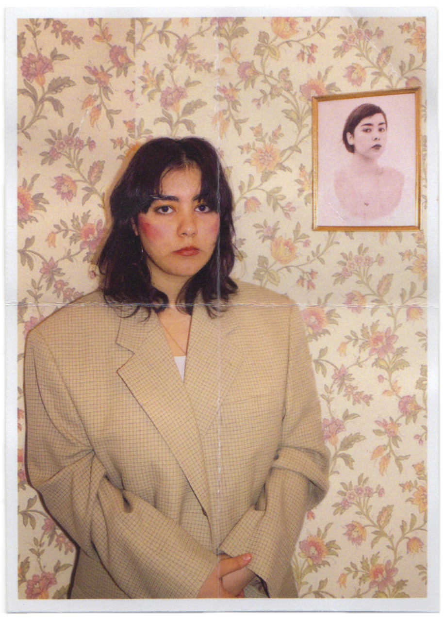 a performance in which i photographed myself in thrifted clothes and then returned the clothes with the photograph in the pocket