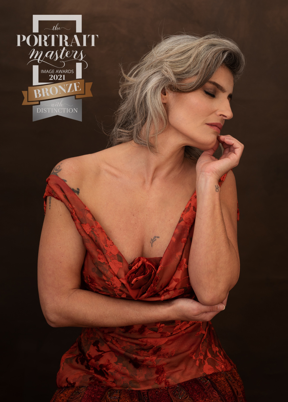 Bronze Distinction in the Contemporary Portrait section of The Portrait Masters' Competition January 2021 for this colour image of a silver-haired gorgeous woman in her 40s.