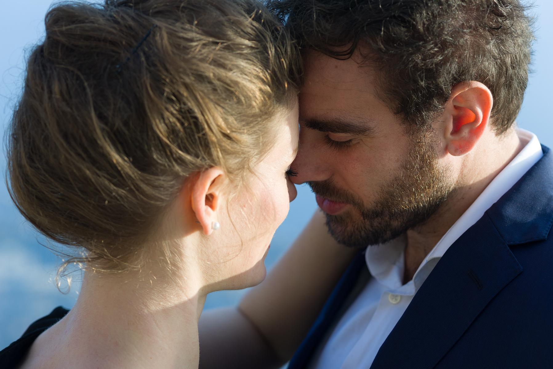 Engagement portraits of a couple truly in love taken at Saint-Saphorin, Switzerland.