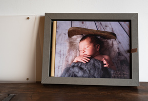 Newborn photography looks wonderful in these customisable GoBook albums. This photo shows the album in its box without the lid.