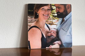 Portrait of a young family with their first baby. Shot in Parc des Eaux-Vives and printed onto a Photoblock.