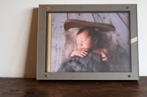 Beautiful portrait of a newborn boy taken in the studio and then printed in a customisable GoBook album from Graphistudio. 