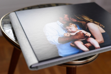 Front cover of a 25x35cm Graphistudio Go-Book Album full of beautiful family portraits shot in my Geneva studio, the album is totally customisable. The quality is amazing.