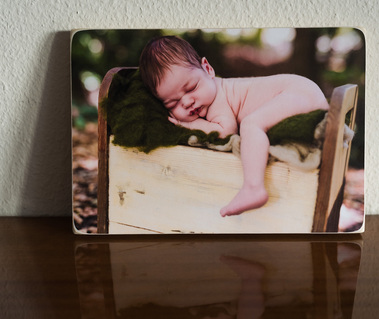 Beautiful Newborn photography by Helen Putsman, maternity, newborn and family photographer, this photo is printed on Photoblocks. They are light and water resistant and of archival quality.