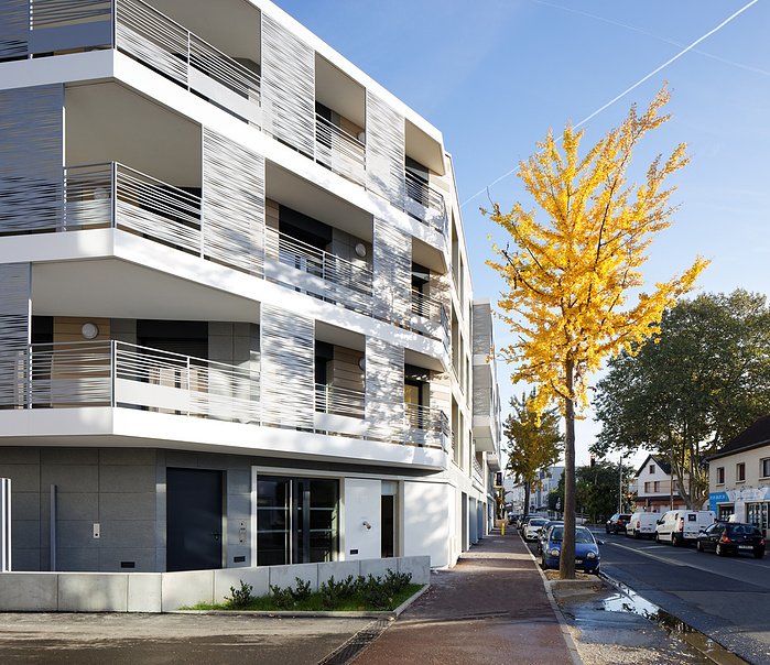 Reportage photo d'architecture de logements, locaux d'activités et commerce, Savigny-sur-Orge. Architecte : Brelan d'Arch Architectes, Maître d’Ouvrage Accession: SCI Briand Savigny, Maître d’Ouvrage social: DOMAXIS, AMO: PHI