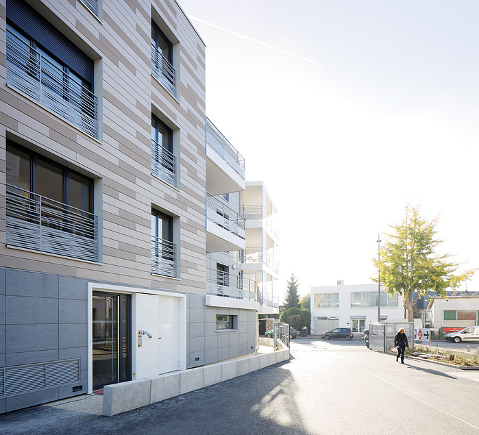 Reportage photo d'architecture de logements, locaux d'activités et commerce, Savigny-sur-Orge. Architecte : Brelan d'Arch Architectes, Maître d’Ouvrage Accession: SCI Briand Savigny, Maître d’Ouvrage social: DOMAXIS, AMO: PHI