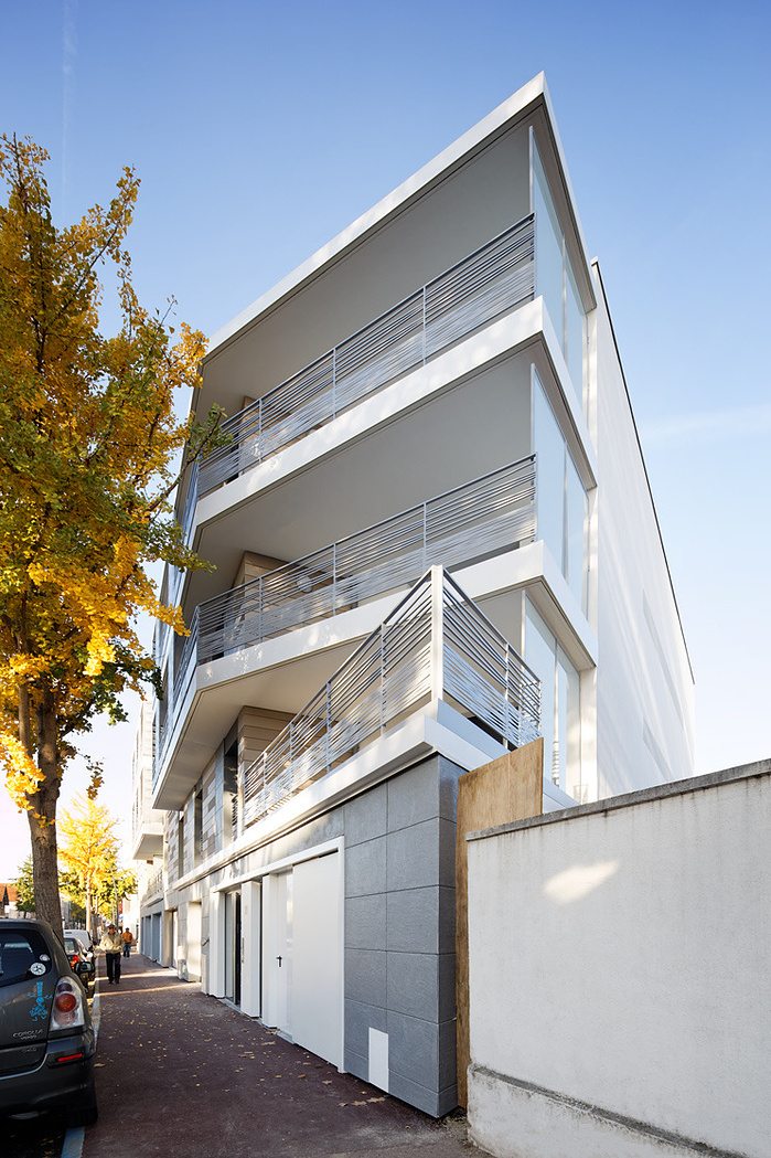 Reportage photo d'architecture de logements, locaux d'activités et commerce, Savigny-sur-Orge. Architecte : Brelan d'Arch Architectes, Maître d’Ouvrage Accession: SCI Briand Savigny, Maître d’Ouvrage social: DOMAXIS, AMO: PHI